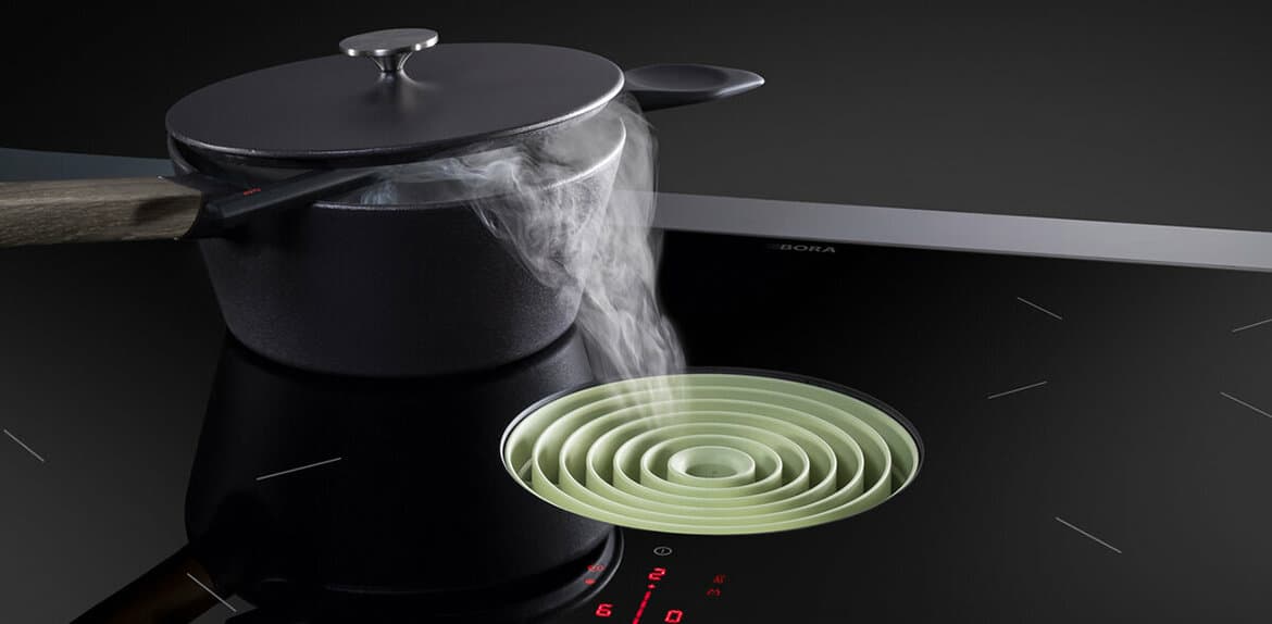 Verlichting in de keuken bij een afzuiging in het werkblad